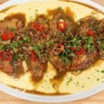 Chicken marsala with crispy pancetta and mushrooms in a rich wine sauce