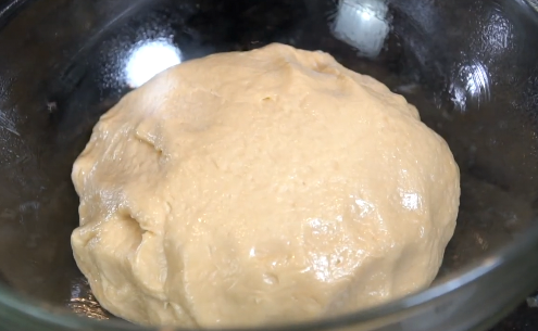 Cinnamon brown sugar filling spread on dough