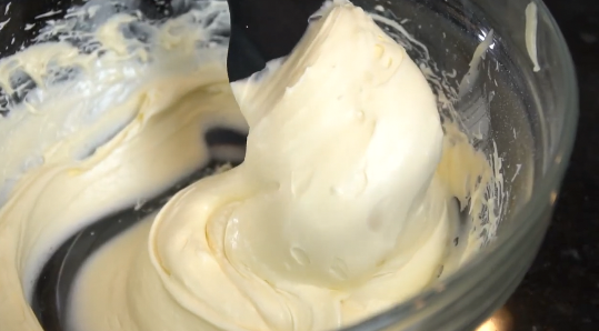 Lemon cream cheese icing being prepared