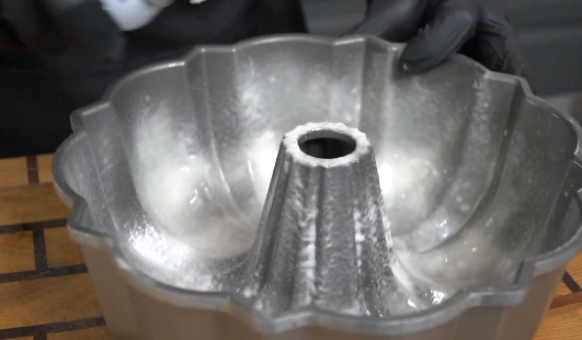 Lemon pound cake batter in Bundt pan before baking