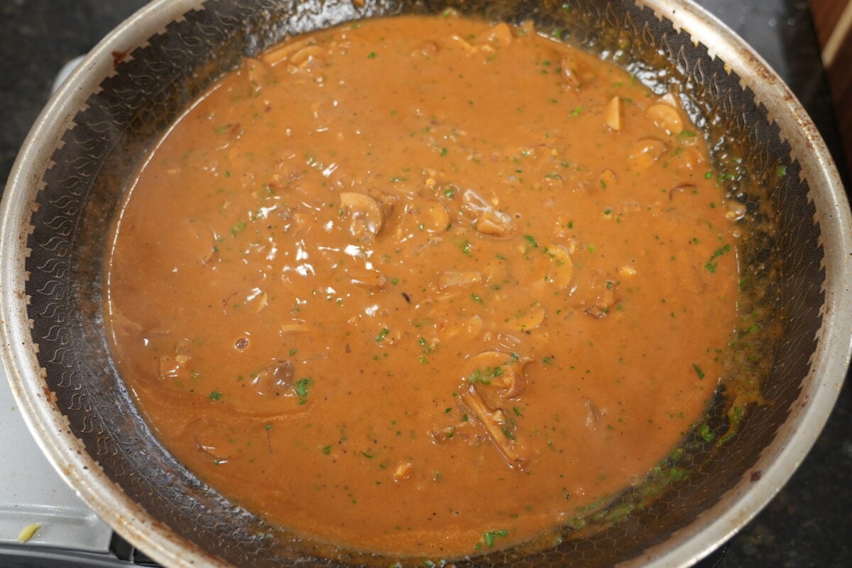 Buttery Yukon Gold mashed potatoes ready to serve with Steak Diane