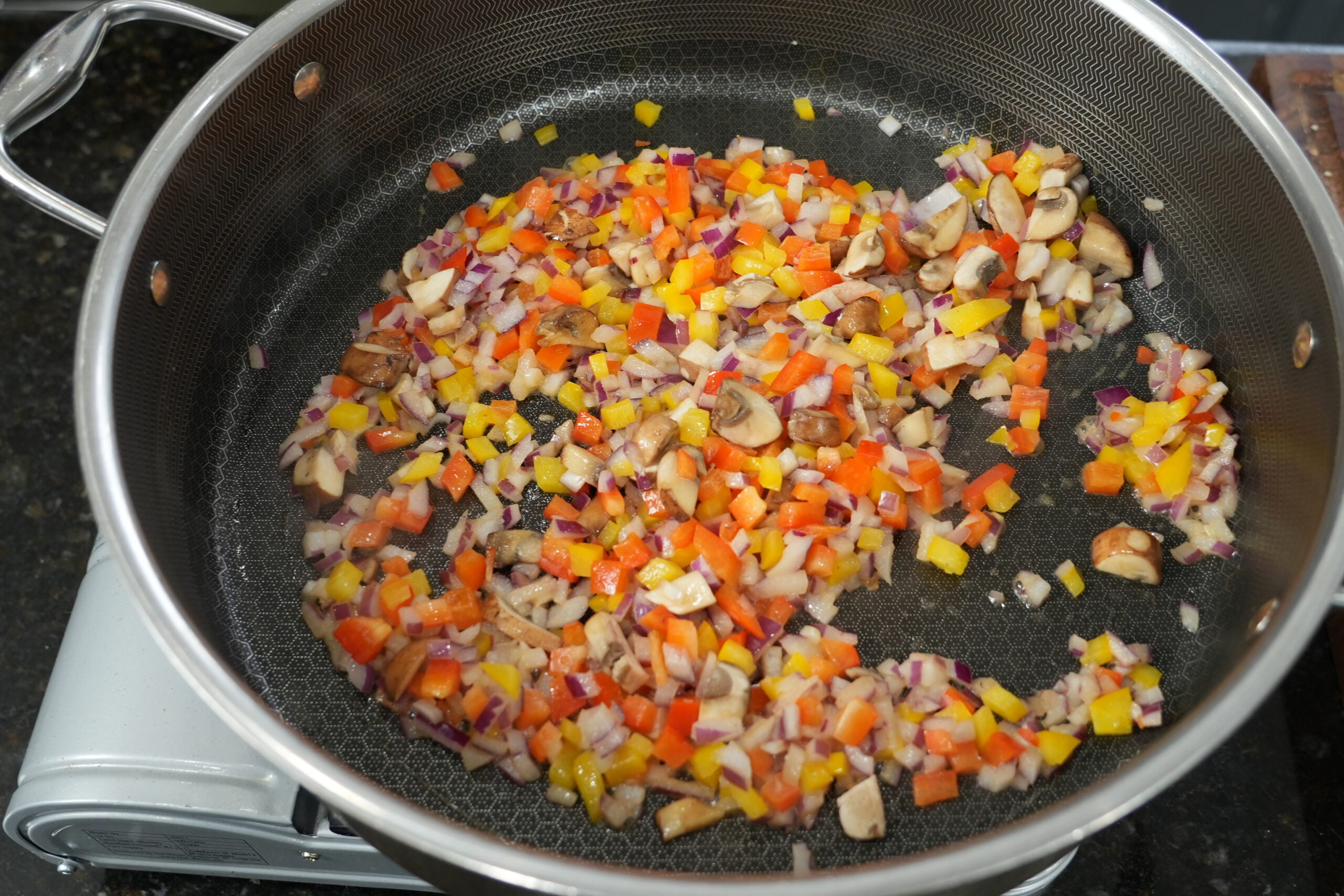 Louisiana chicken pasta plated with sliced chicken