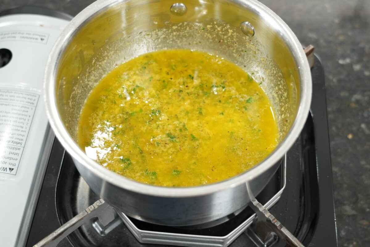 melted garlic butter with herbs and parsley