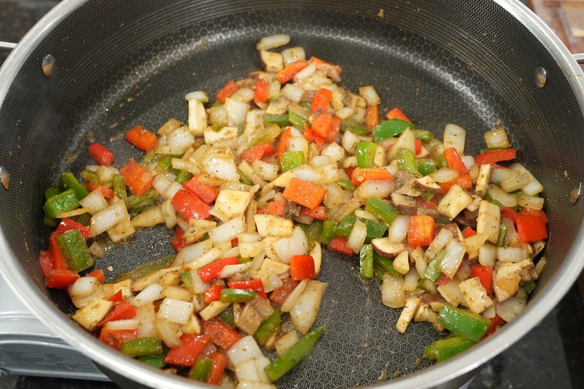 cooked vegetables with Worcestershire sauce for cheesesteak slider filling