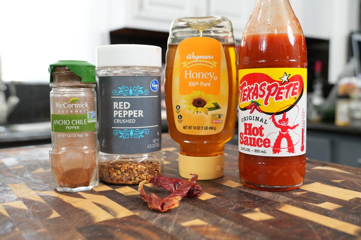 frying breaded chicken thighs in oil until golden and crispy