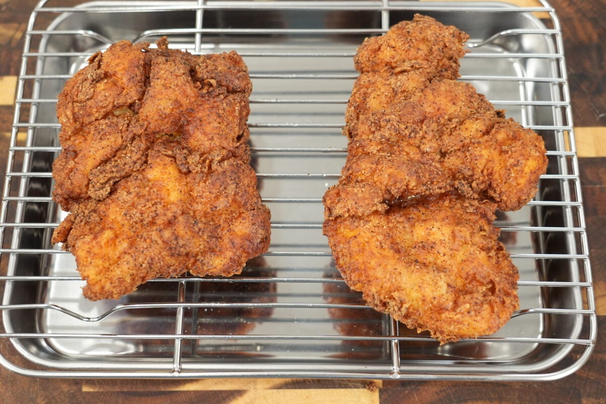 hot honey chicken sandwich served with fries on a plate