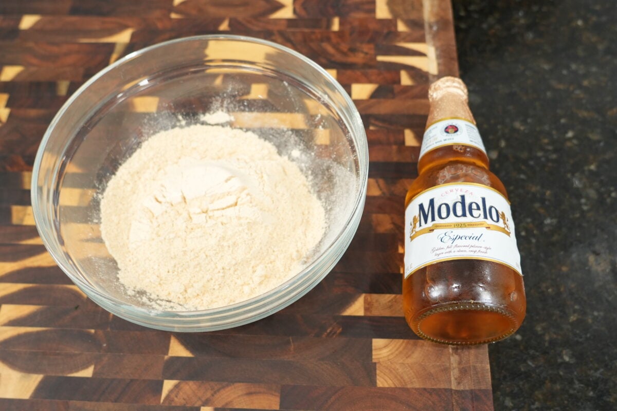 Whisking the golden batter until smooth