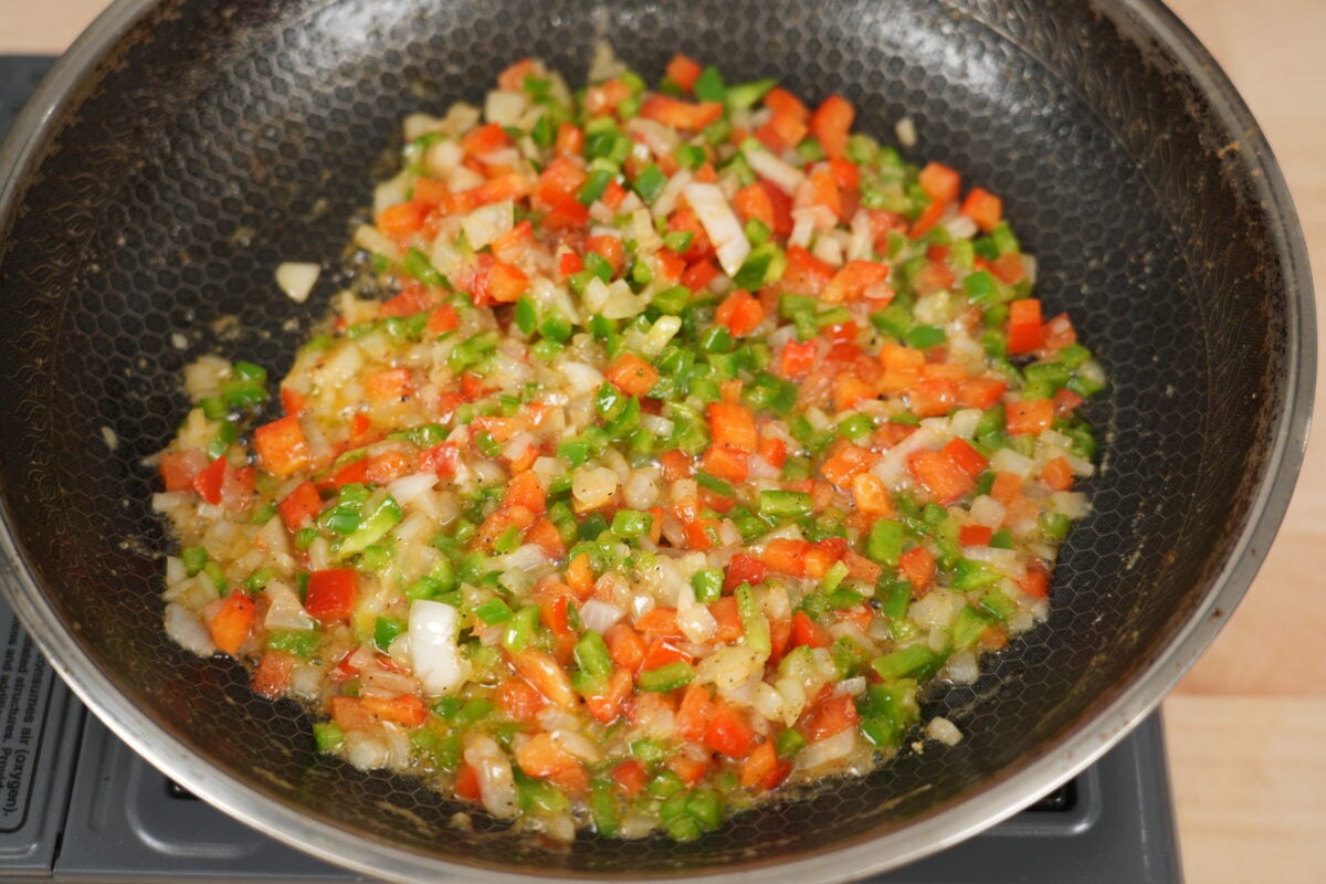 Stuffing the jumbo pasta shells with the shrimp and crab seafood filling