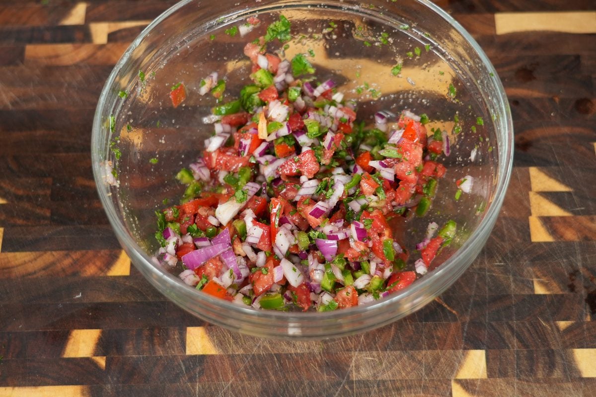 Fresh pico de gallo for beef nachos with diced tomato, red onion, jalapeno, and cilantro
