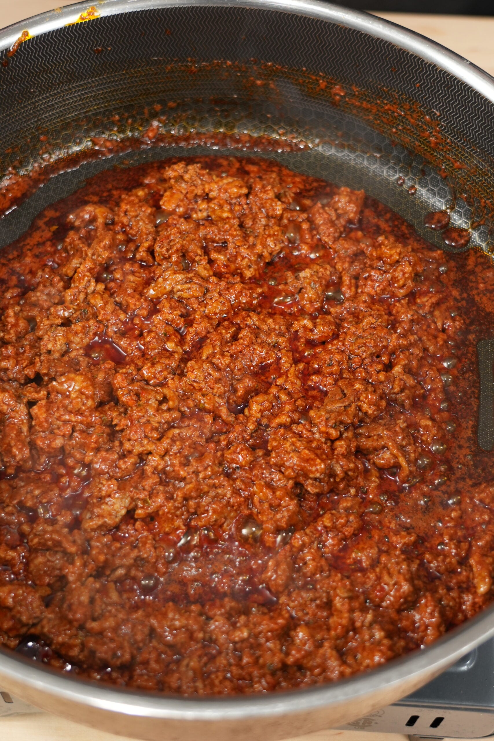 Ground beef and chorizo browned for queso dip