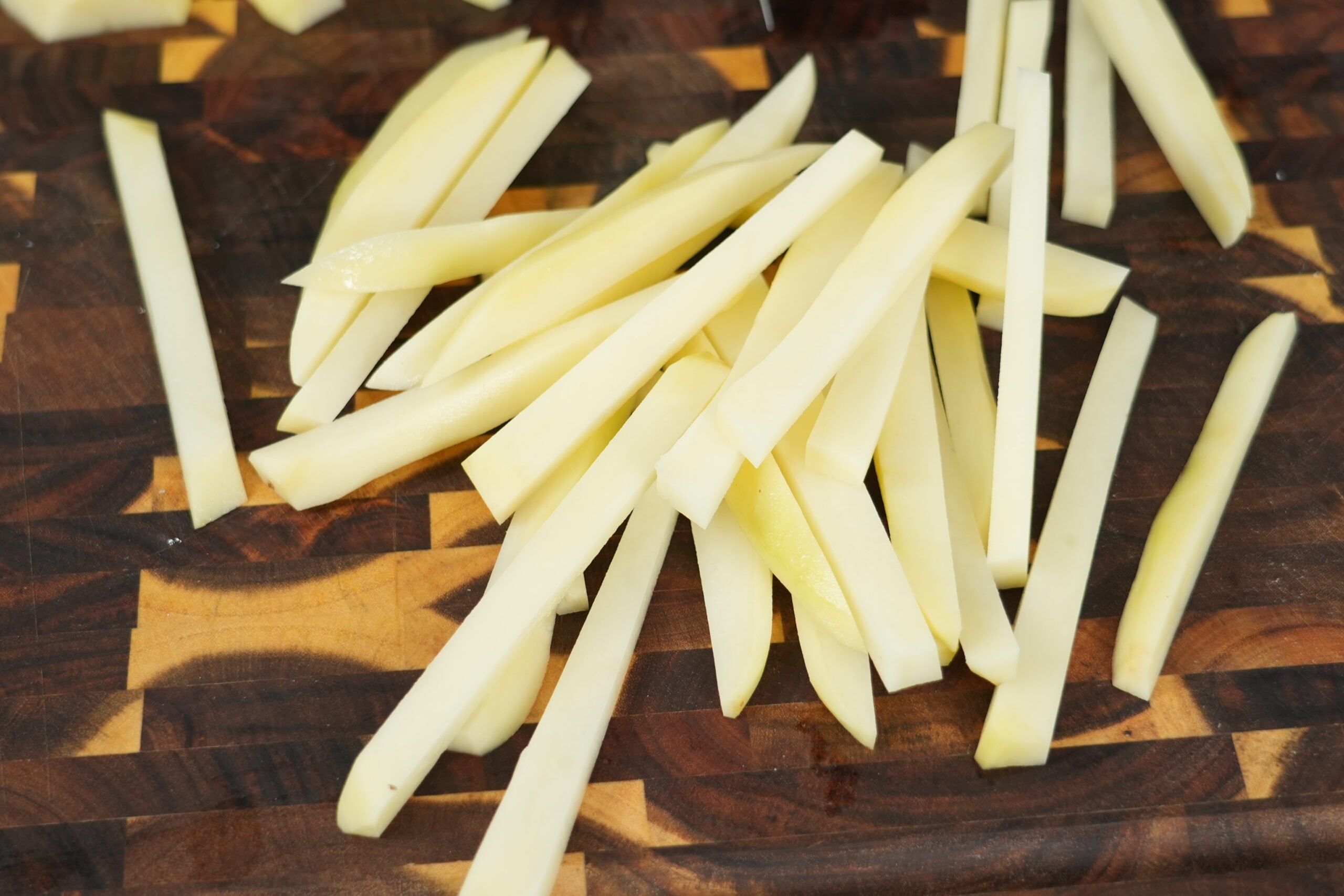 Russet potatoes cut into thick chips