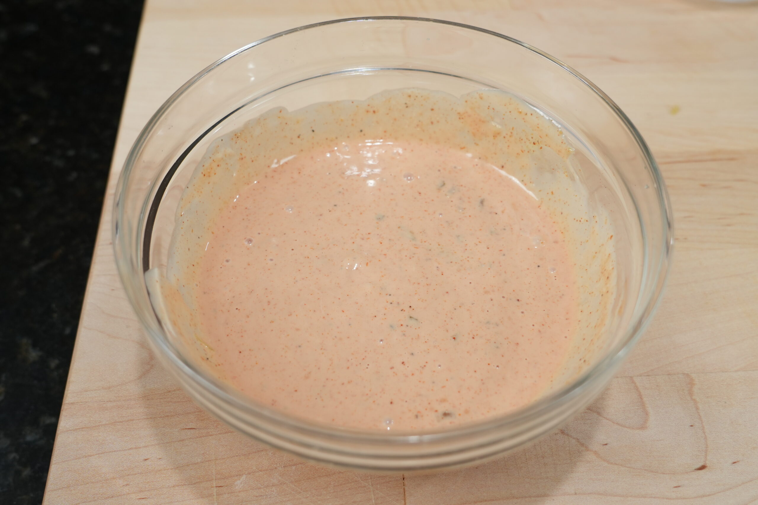 Creamy burger dipping sauce in a glass bowl