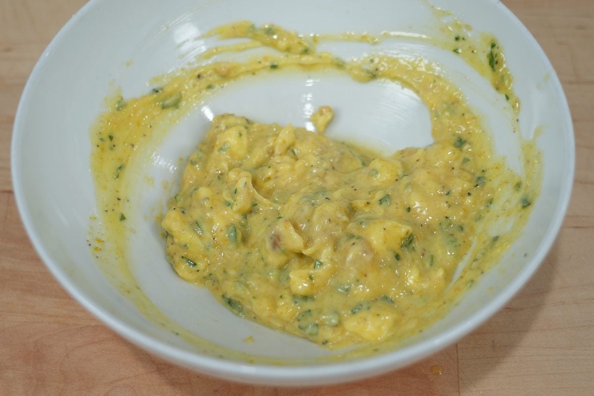 Roasted garlic and parsley mixed into butter for hot honey chicken garlic bread
