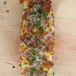 Hot honey chicken garlic bread with crispy chicken, mozzarella and spicy honey drizzle